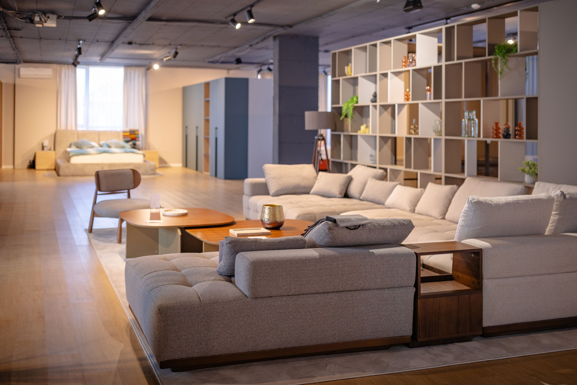 Spacious modern living area with large sectional sofa.