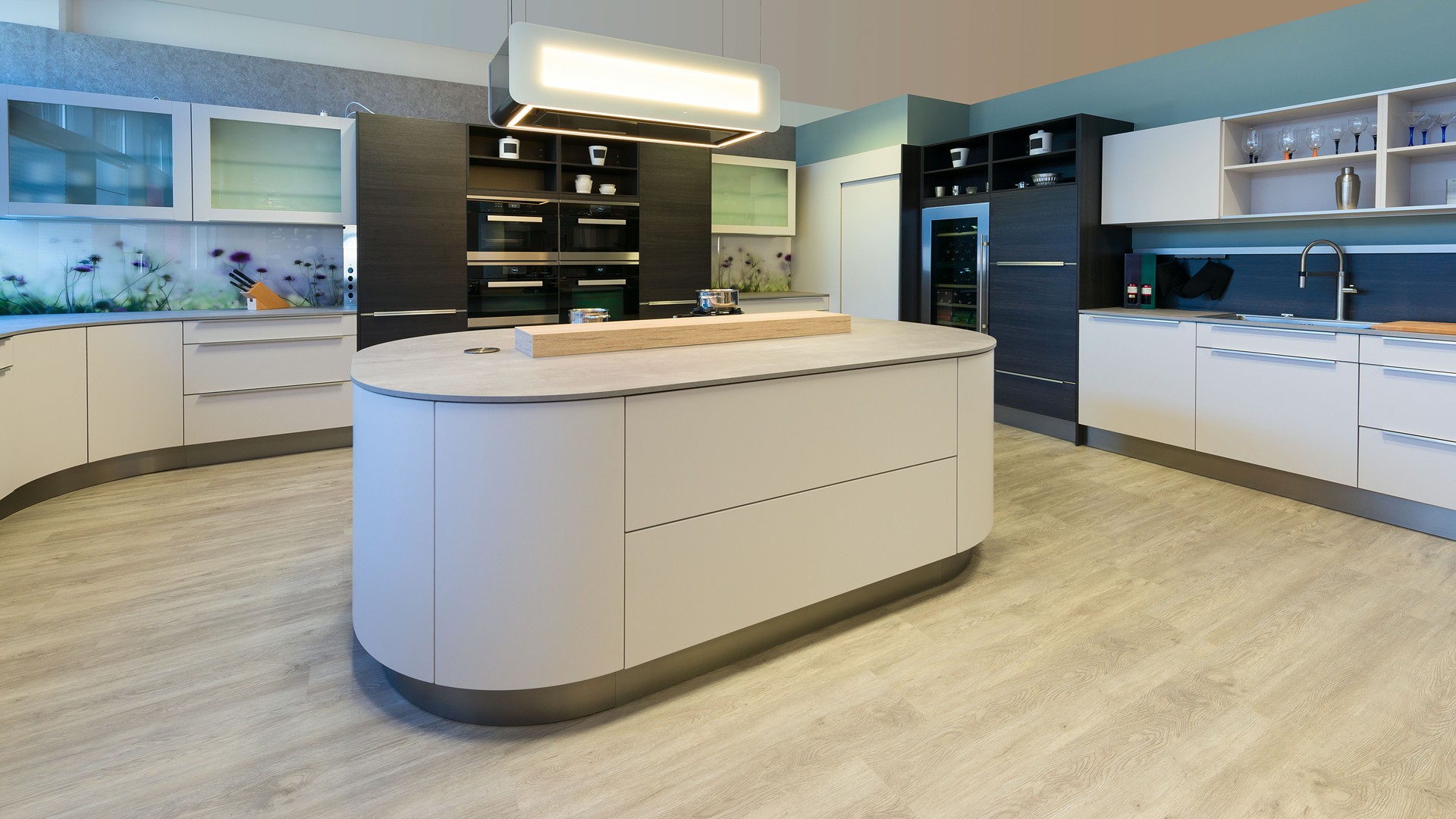 large designer kitchen with island rounded corners and lacquered fronts